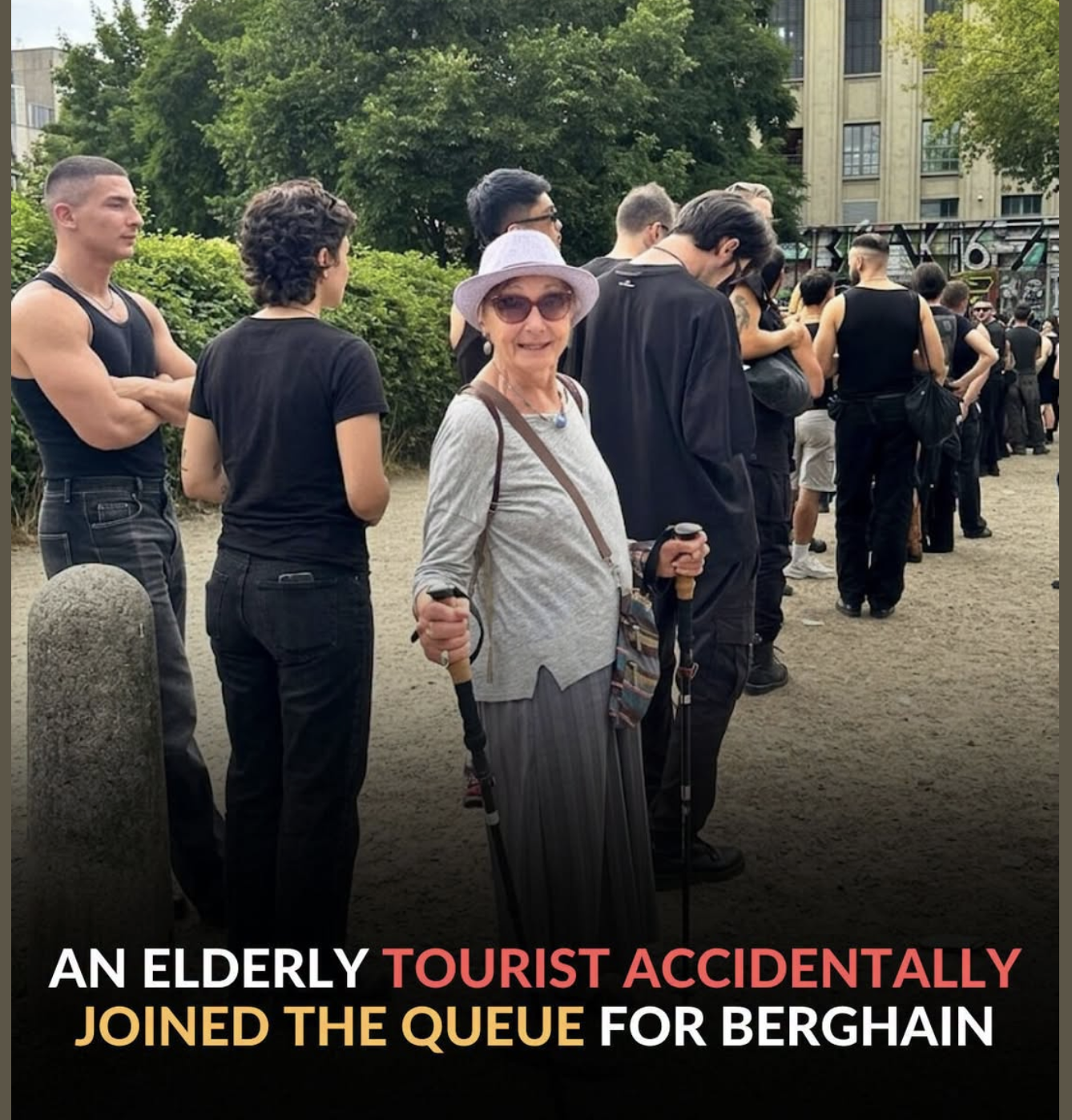 An elderly tourist in a lavender bucket hat and hiking poles accidentally standing in the all-black-clad queue for Berghain nightclub in Berlin.